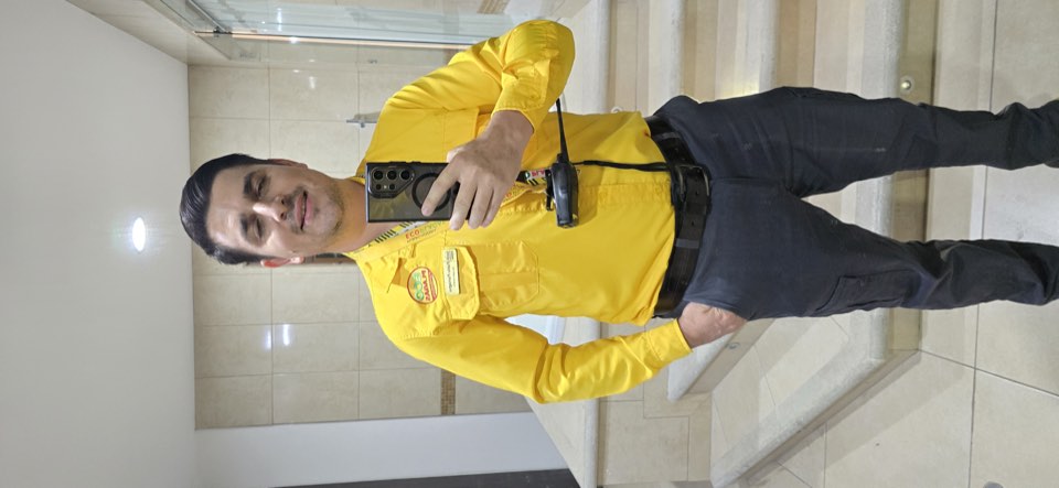 Uniformed EcoPlagas technician ready for a fumigation service